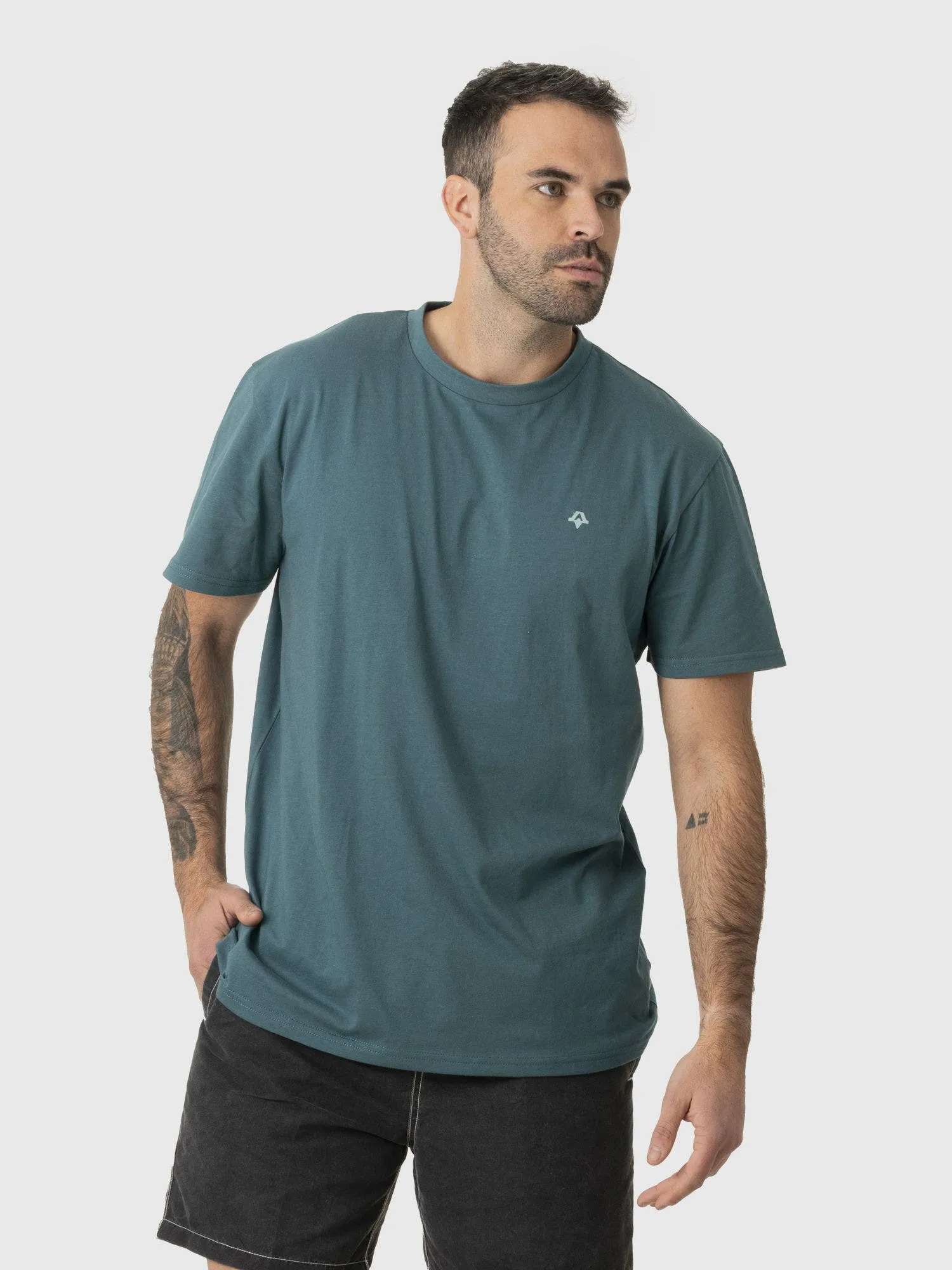 KIVUL Polera Kivul Postales Reciclada Hombre Teal